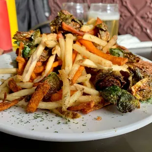 Fries, sweet potato fries, and fried sprouts appetizer