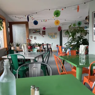 a green table and chairs