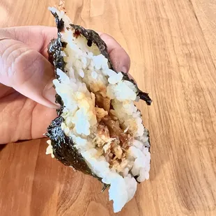 Pork Belly Onigiri (Japanese rice ball). Inside is shredded pork belly and sweet sauce.