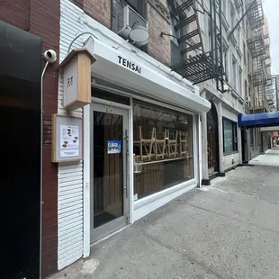 the outside of a building with a sign on it