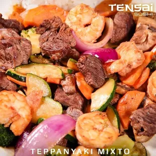 a close up of a plate of stir fried vegetables