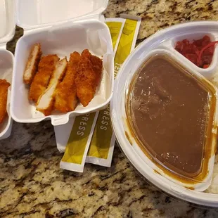 Current chicken curry dish with two chicken cutlets (trying to match the old meal, but with less food at a much higher price)