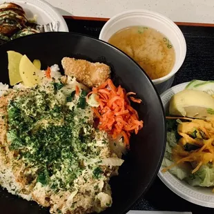 a plate of rice and vegetables