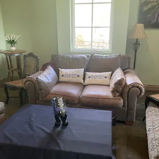 a living room with couches and a coffee table