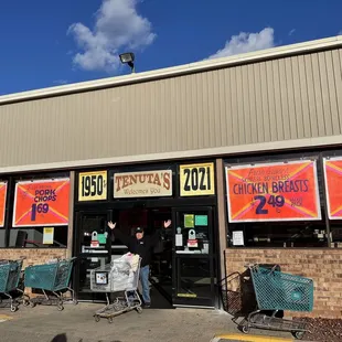 Front Entrance- with an enthusiastic shopper- this small grocery is PACKED with great food!!