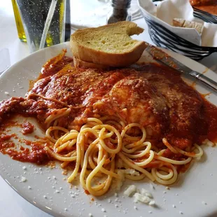 Chicken Parm with garlic bread after I tried it.