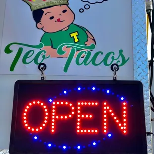 a neon sign for a mexican restaurant
