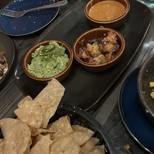 Salsa trio. Guac, chunky pineapple and habanero, macha