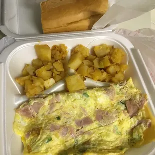 Spanish omelette, home fries &amp; buttered bread