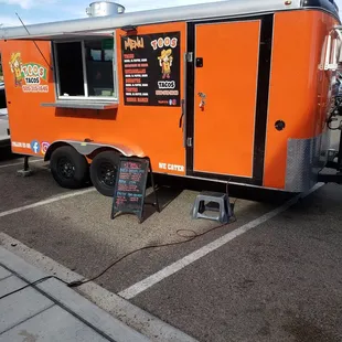 a food truck parked in a parking lot