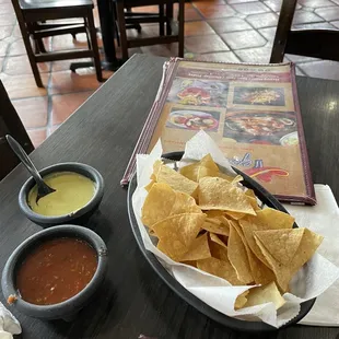 Chips and Salsa Green is the hotter one Both good