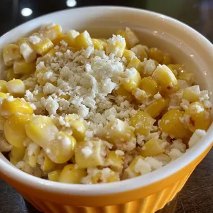 Corn Bowl ... seasoned and topped with cheese.  Had a salted overtone.