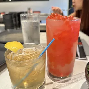 Poppin bubbles drink and momo whiskey sour