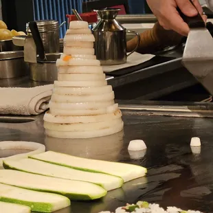 a chef preparing food in a kitchen