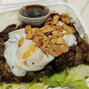 Steak Roll with egg and garlic chips