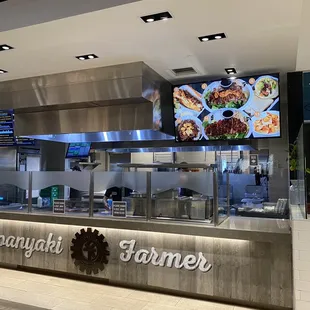 a restaurant counter with food on it