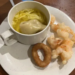 Egg drop soup, wonton, onion ring, and coconut shrimp