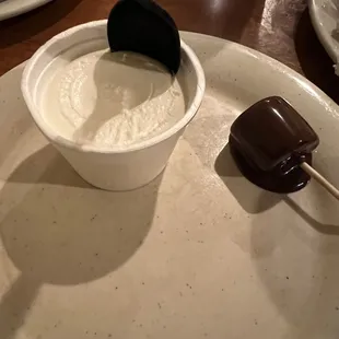 Ice cream and marshmallow dipped in the chocolate fountain