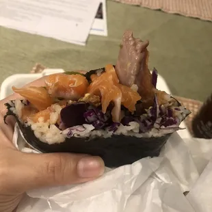 Mt Fuji burrito, no tuna. Long pieces of fish with tough membrane that&apos;s impossible to bite through.
