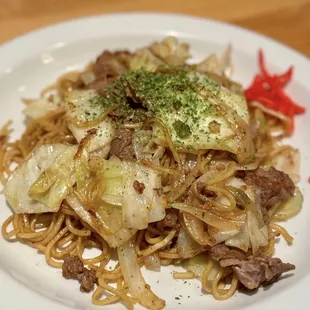Yakisoba with beef - stir fried ramen-style noodles with cabbage, onion, with added beef