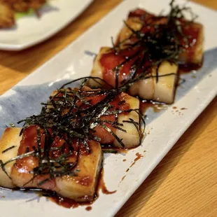 Bacon mochi - grilled bacon-wropped mochi with teriyaki sauce