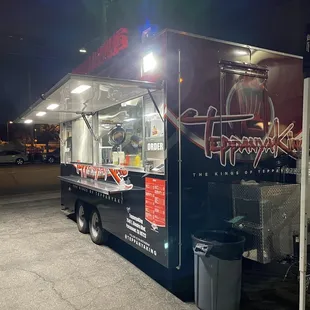 a food truck parked in a parking lot
