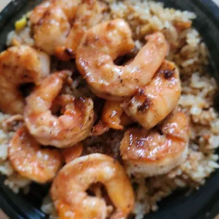 a bowl of shrimp and rice
