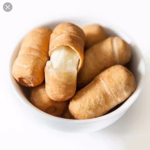 a bowl full of doughnuts