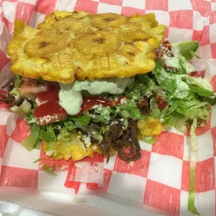 Beef Patacon. Get it with the hot green sauce! Super Good