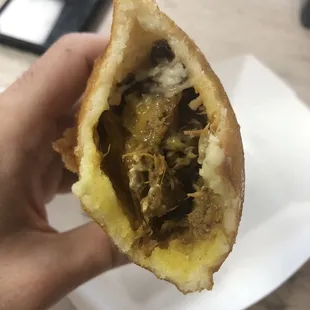 ows a half eaten sandwich