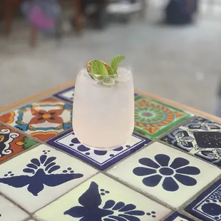 a close up of a drink on a table