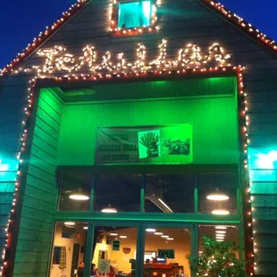 Front of the restaurant at night.