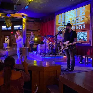 a band performing at a bar