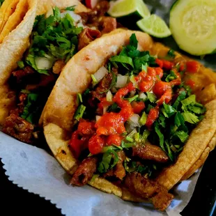 two tacos and a cucumber