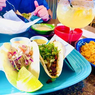 Tacos and and an organic margarita with a side of rice.
