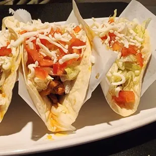three tacos on a plate