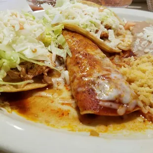 Tostada, enchilada, and taco with rice and beans