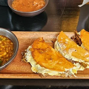 Quesabirria tacos with a side of consome
