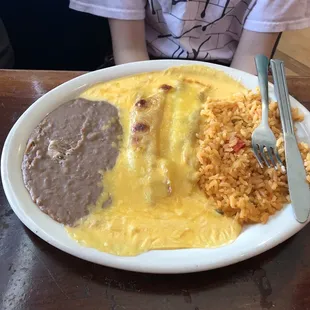 Cheese enchiladas with chili con queso