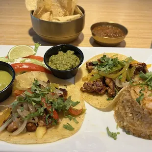 Pork tacos pastor, chips and salsa.