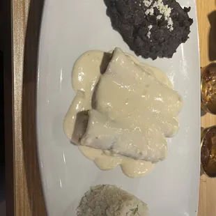 Rojas enchiladas sub sour cream sauce