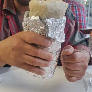 My husband&apos;s big burrito. Super flavorful.