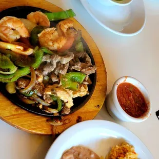 Pardon the blur but this triple meat fajita plate was SIZZLING  and steaming! !