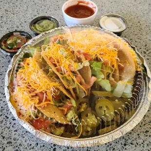 Tacos to go - might ask for extra condiments next time since it's an order of 6 tacos.