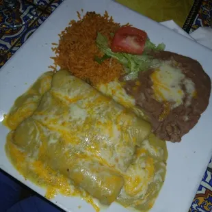 Chicken enchiladas with green sauce.