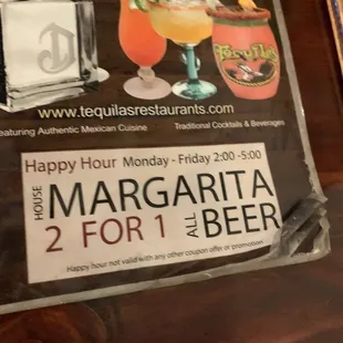 2 for 1 margaritas menu that is on the table.