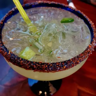 Jalapeño marg with Tajin rim... omg, best spicy marg around. Fresh chunks of Jalapeño. This bad boy don&apos;t play mild.