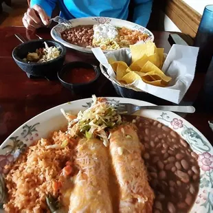 Chicken enchiladas &amp; pork tamale with whole pinto beans &amp;rice