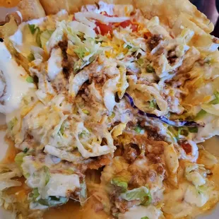 I forgot to take a pic before I started tearing up my taco salad. I  recommend asking for white cheese sauce on it... it&apos;s THE BEST.