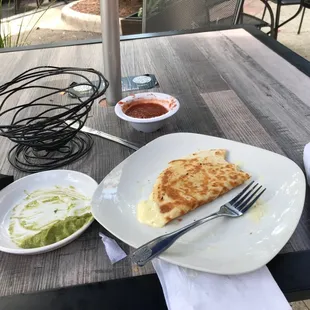 a slice of quesadilla on a plate